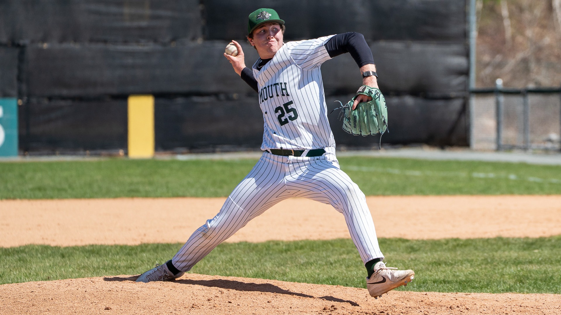 Dylan Bausemer delivers a pitch against Castleton