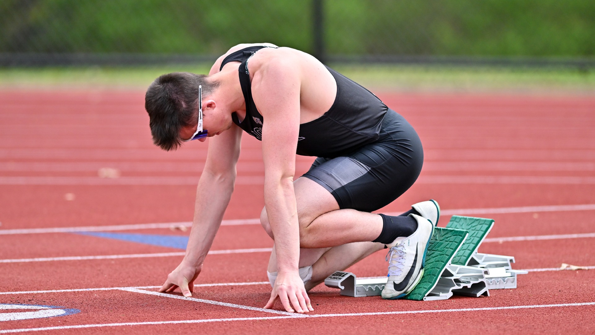 Zach Hodge in the starting blocks of the 400 meters