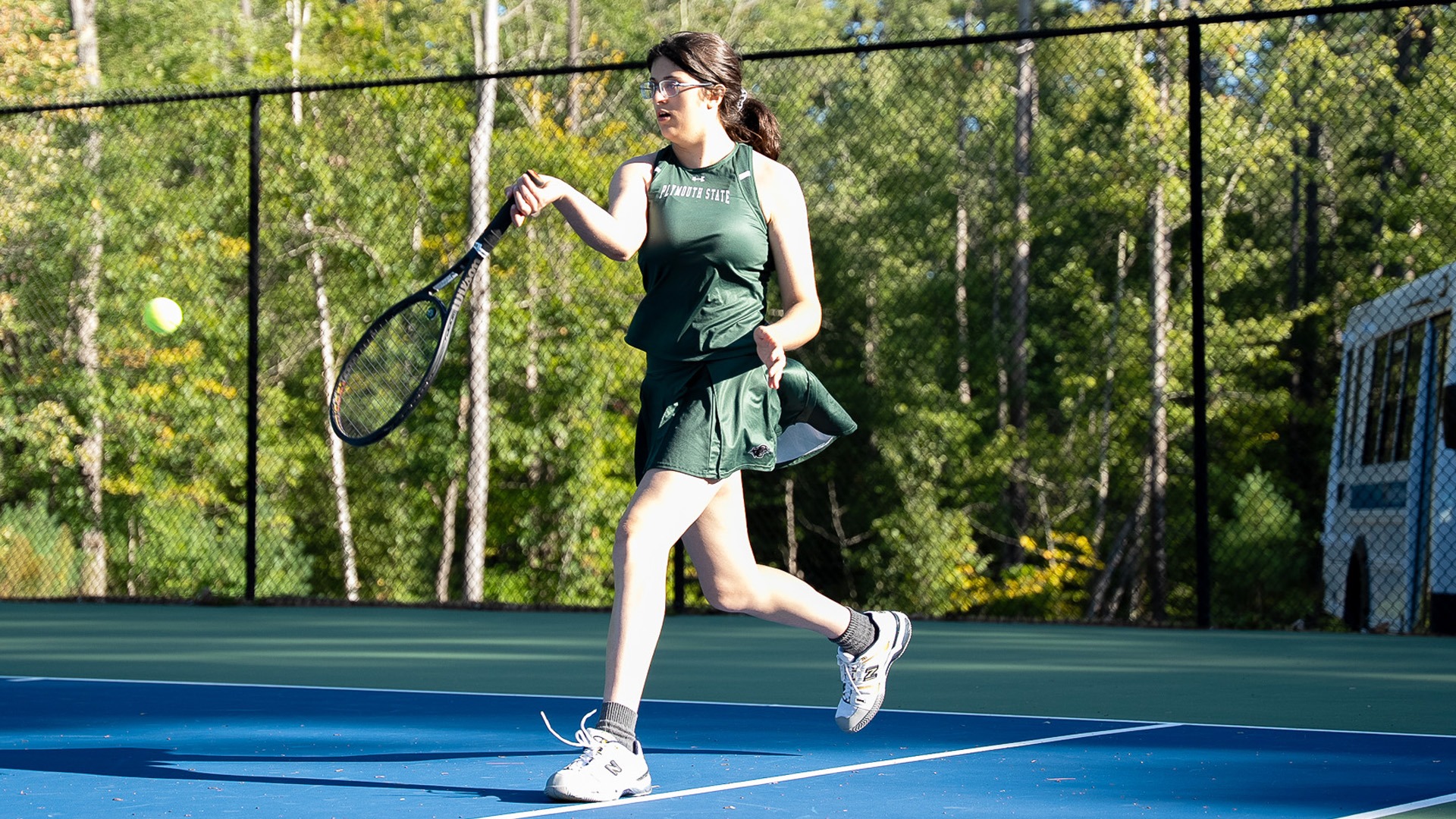 Leela Bakhshi returns a serve against Plattsburgh State