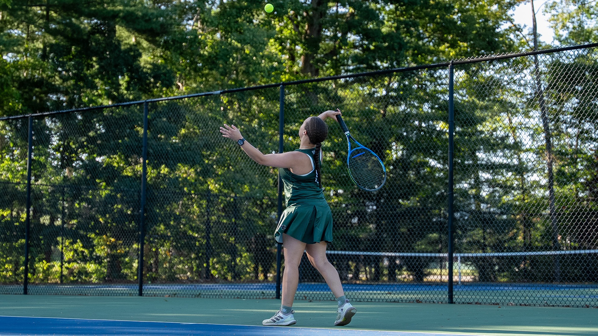 Anyah Fields rips a serve against Plattsburgh State