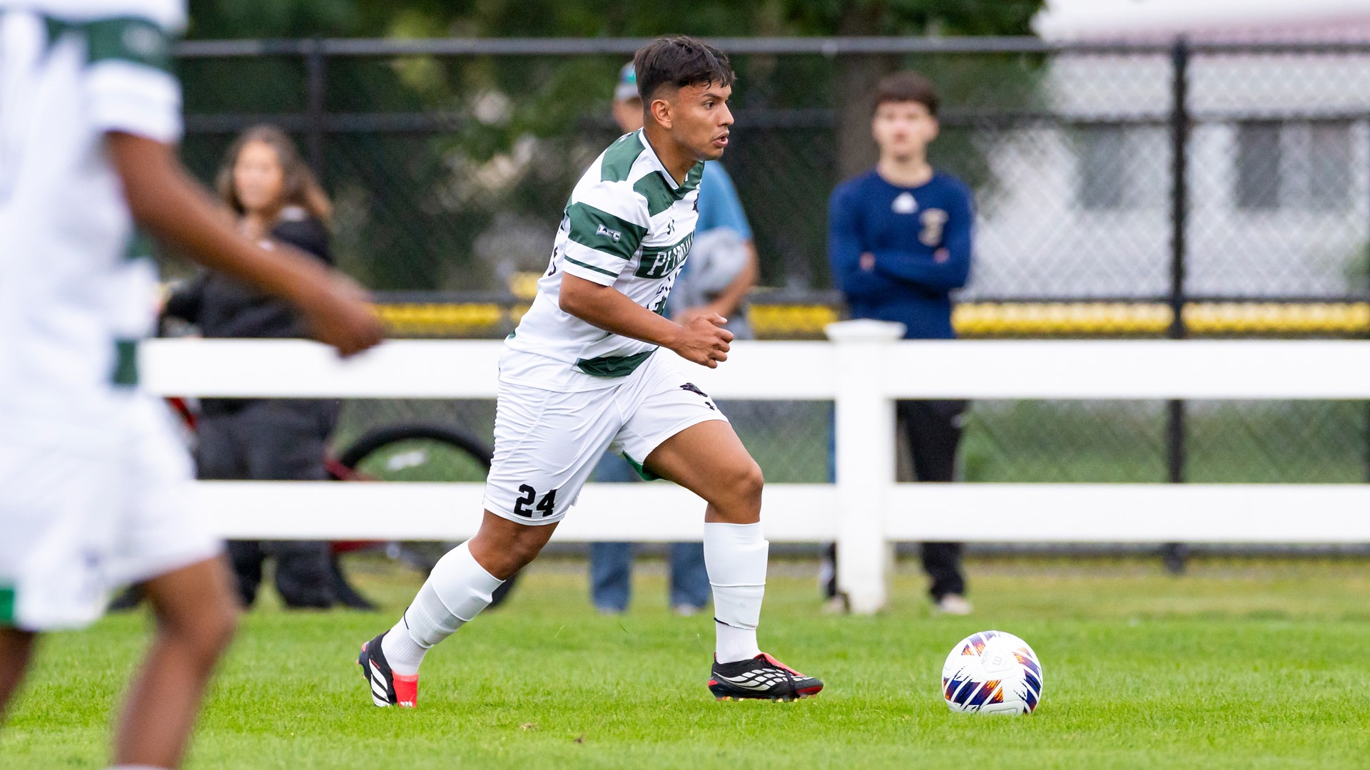 Christian Torres dribbles into space in the season opener against NEC