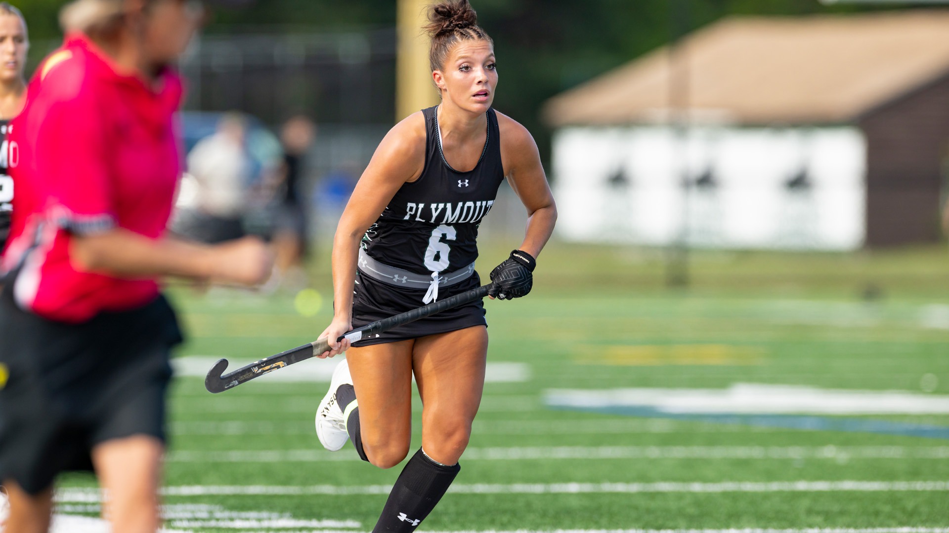 Abby Bsullak sprints up the field against Bridgewater State