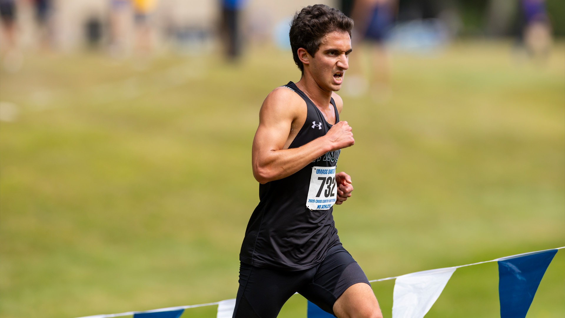 Max Goodman nears the finish line at the UMass Dartmouth Invitational