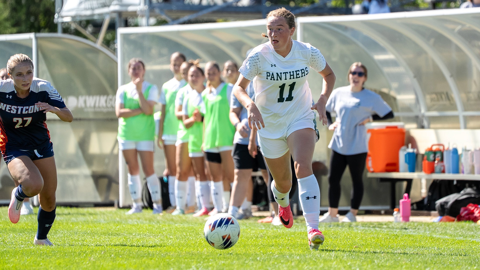 Maggie MacDonald beats a WestConn defender