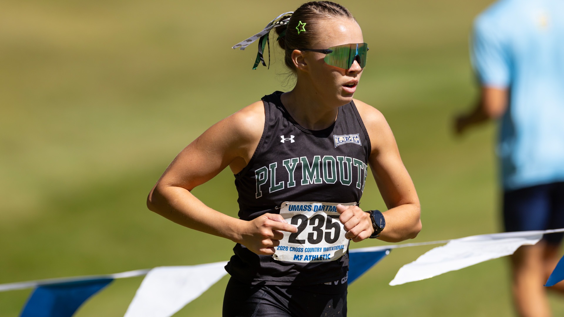 Rose Karow attacks the 6K course at the UMass Dartmouth Invitational