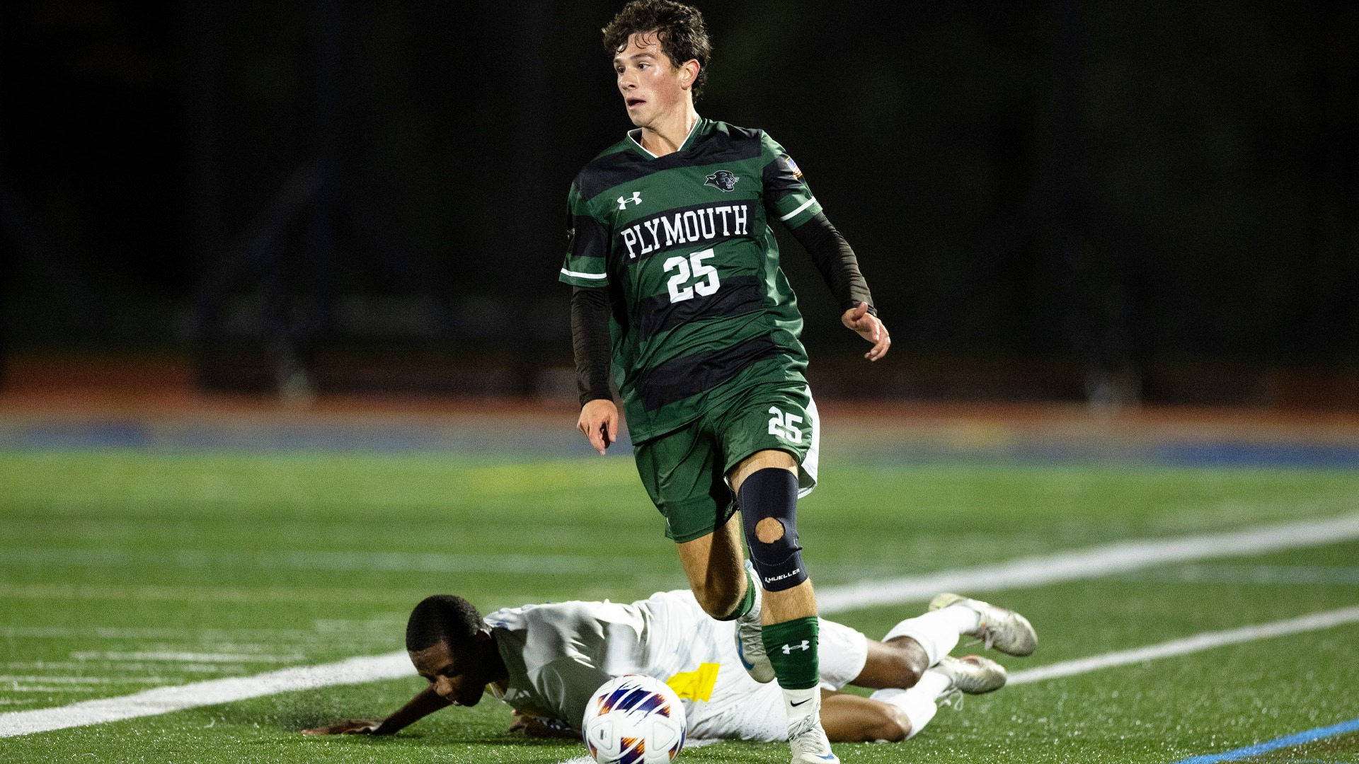 Cam Bastien sets up a shot against Worcester State