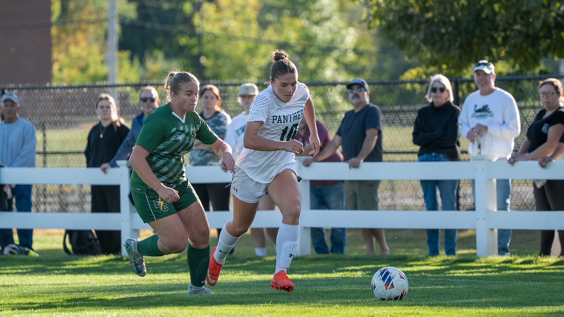 Drea Oswell dribbles past an Elms defender.