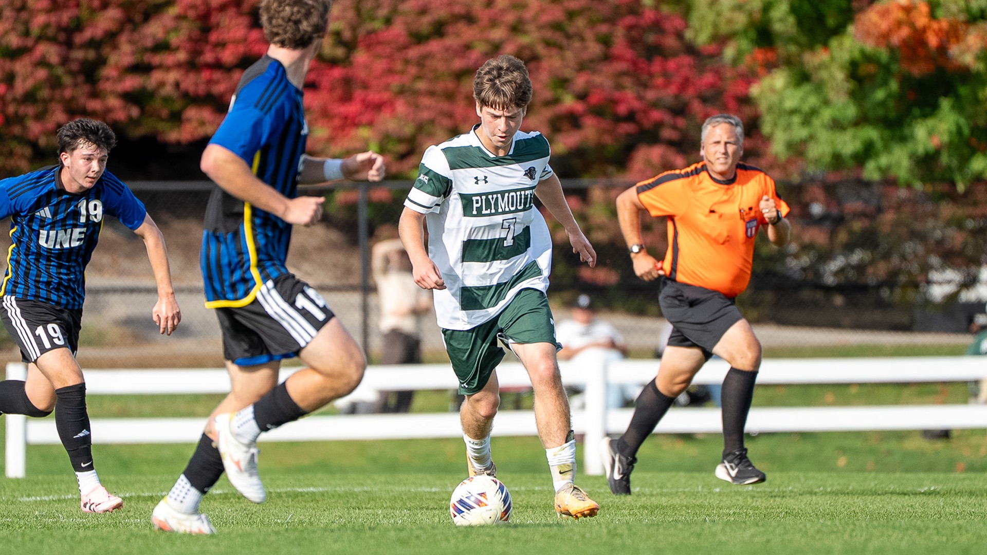 George Bergin dribbles past a defender against UNE