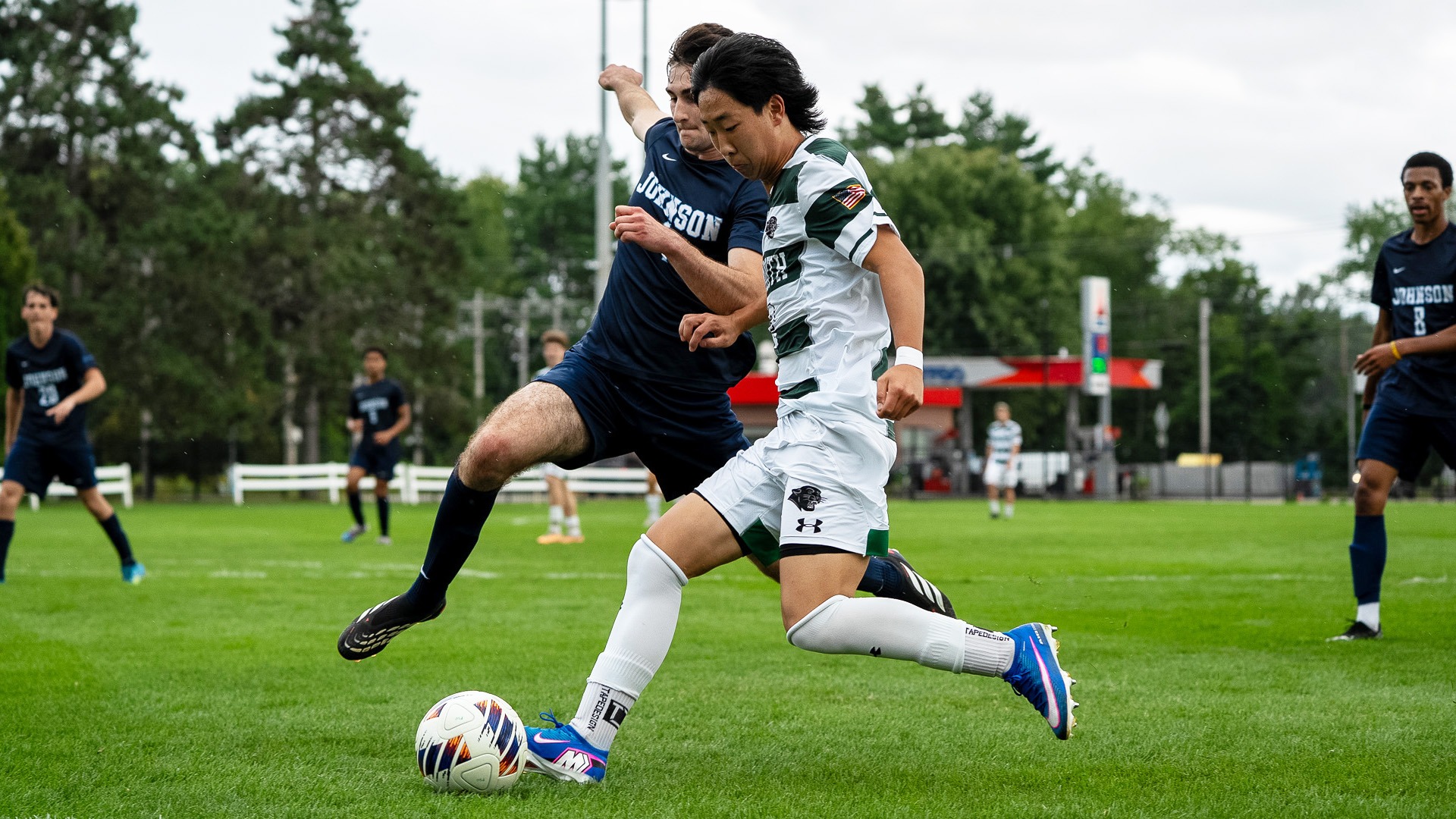 Ian Maeby moves around a VTSU Johnson defender