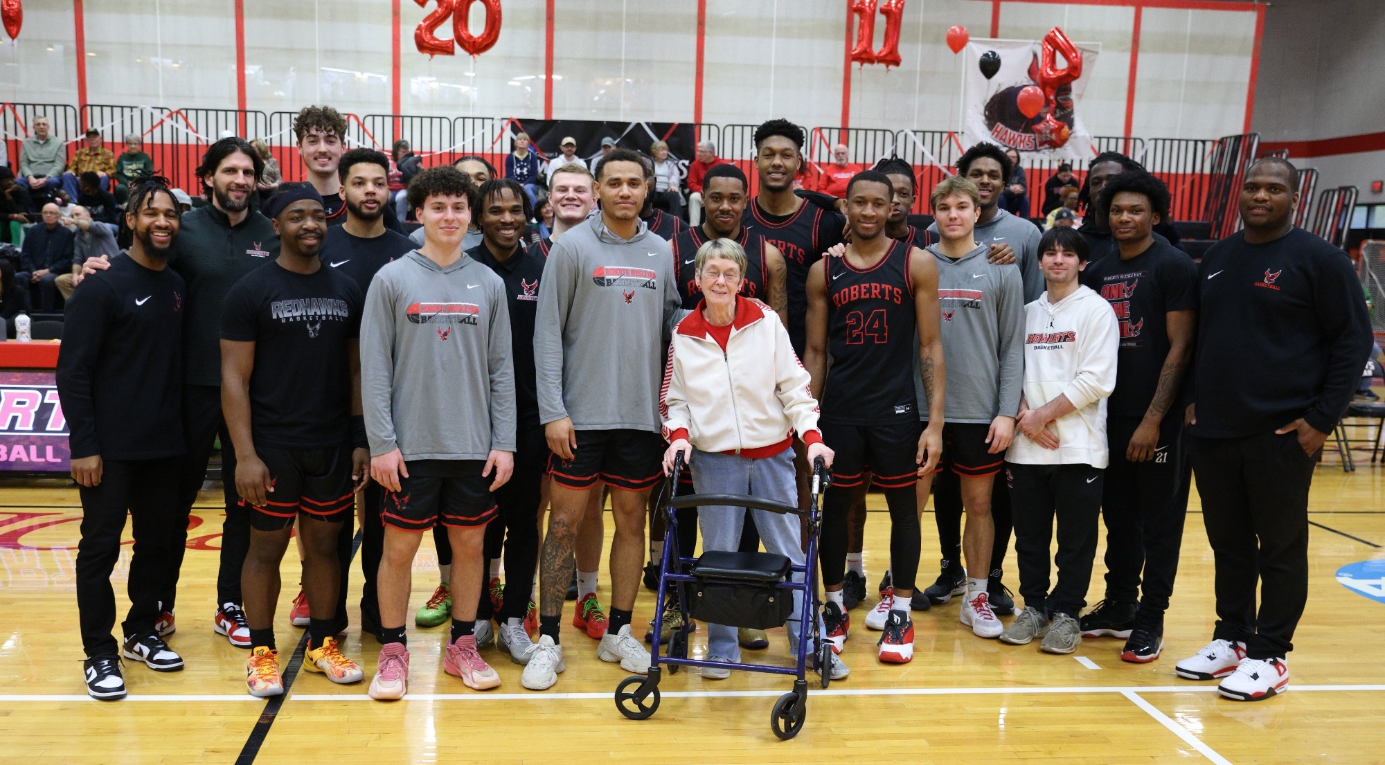 Sue Harkins with 2024 Men's Basketball Team