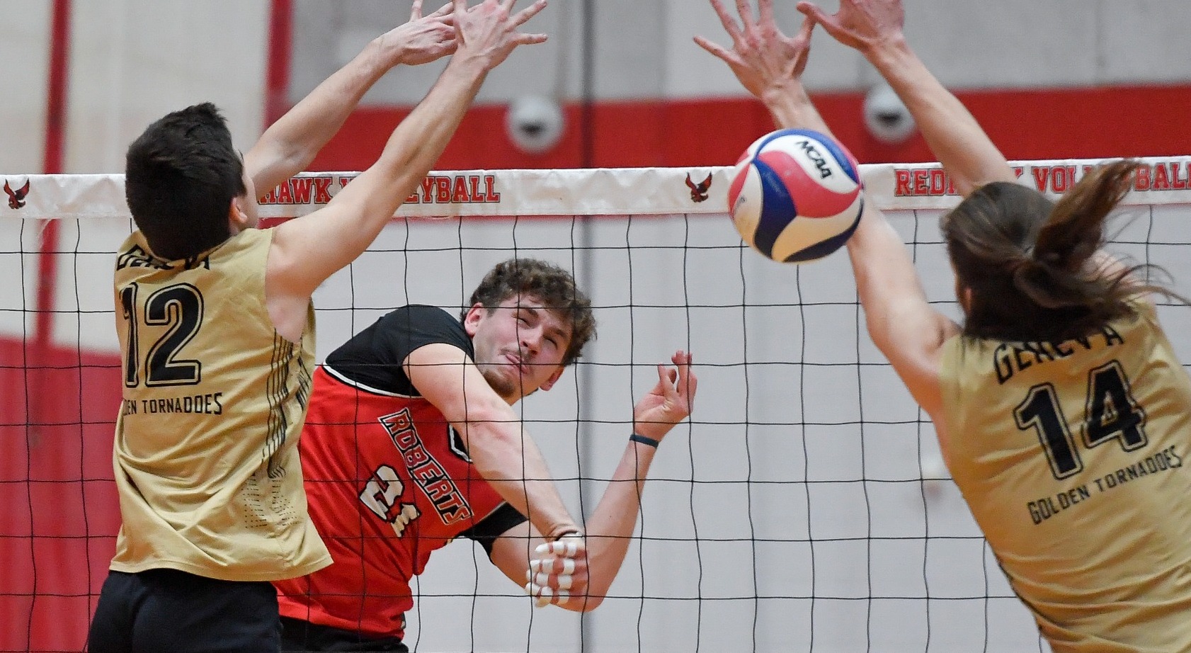Roberts Wesleyan's Paul Fillion plays during an NCAA college volleyball match against Geneva College in Rochester, N.Y., Thursday, Jan. 30, 2025.