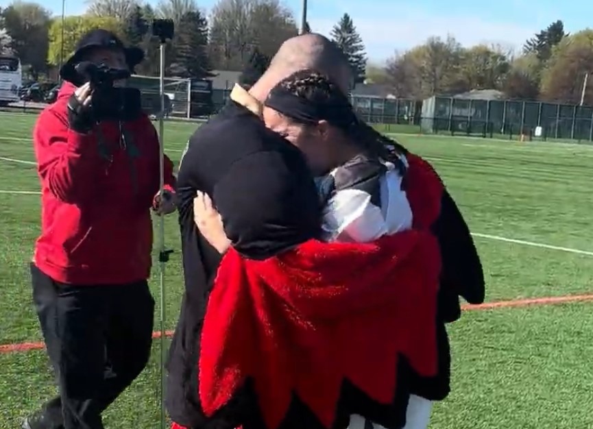 Shawna Lesmerises hug 