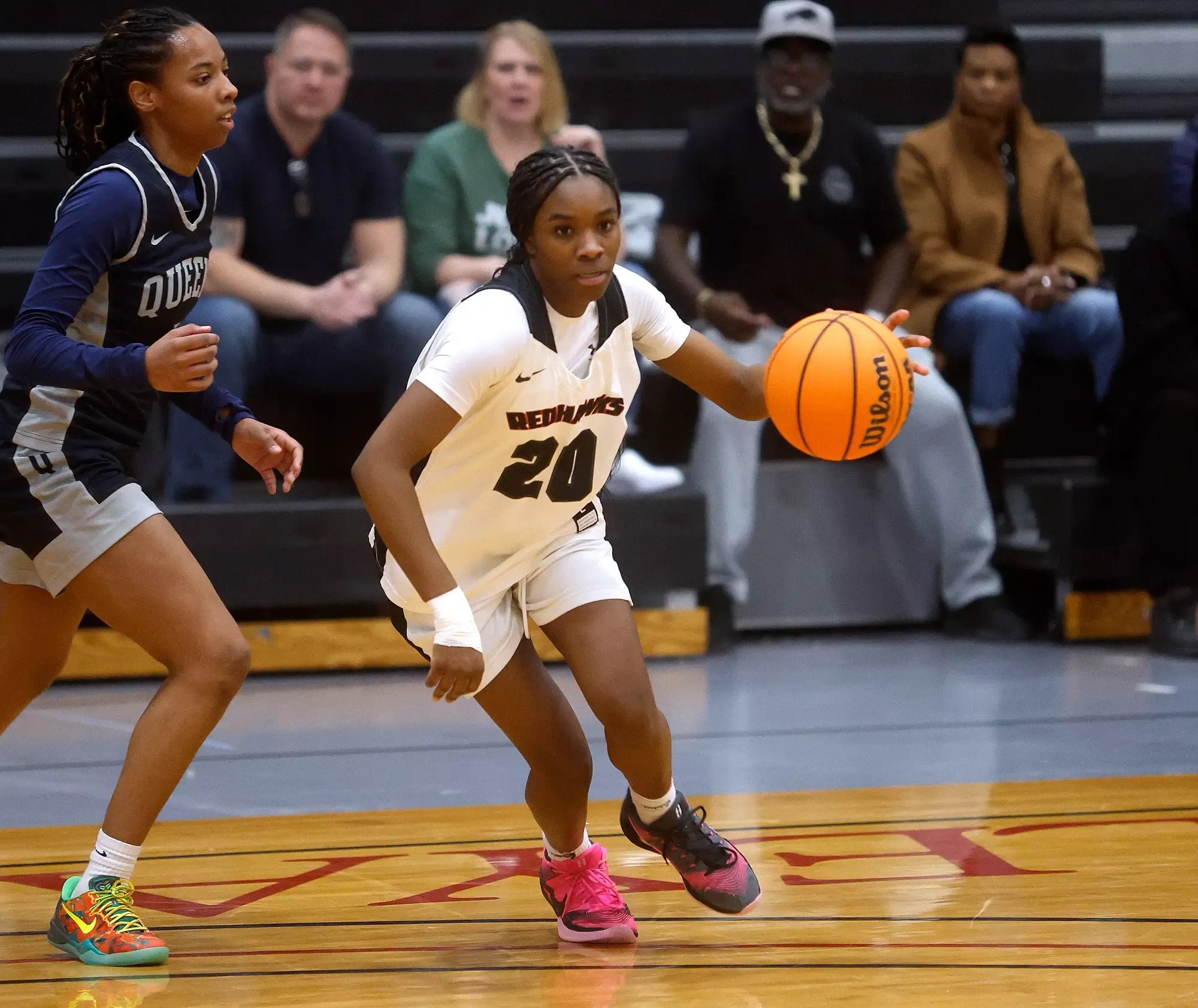 Jada Mushat drives toward the basket against Queens College on Feb. 15, 2026.