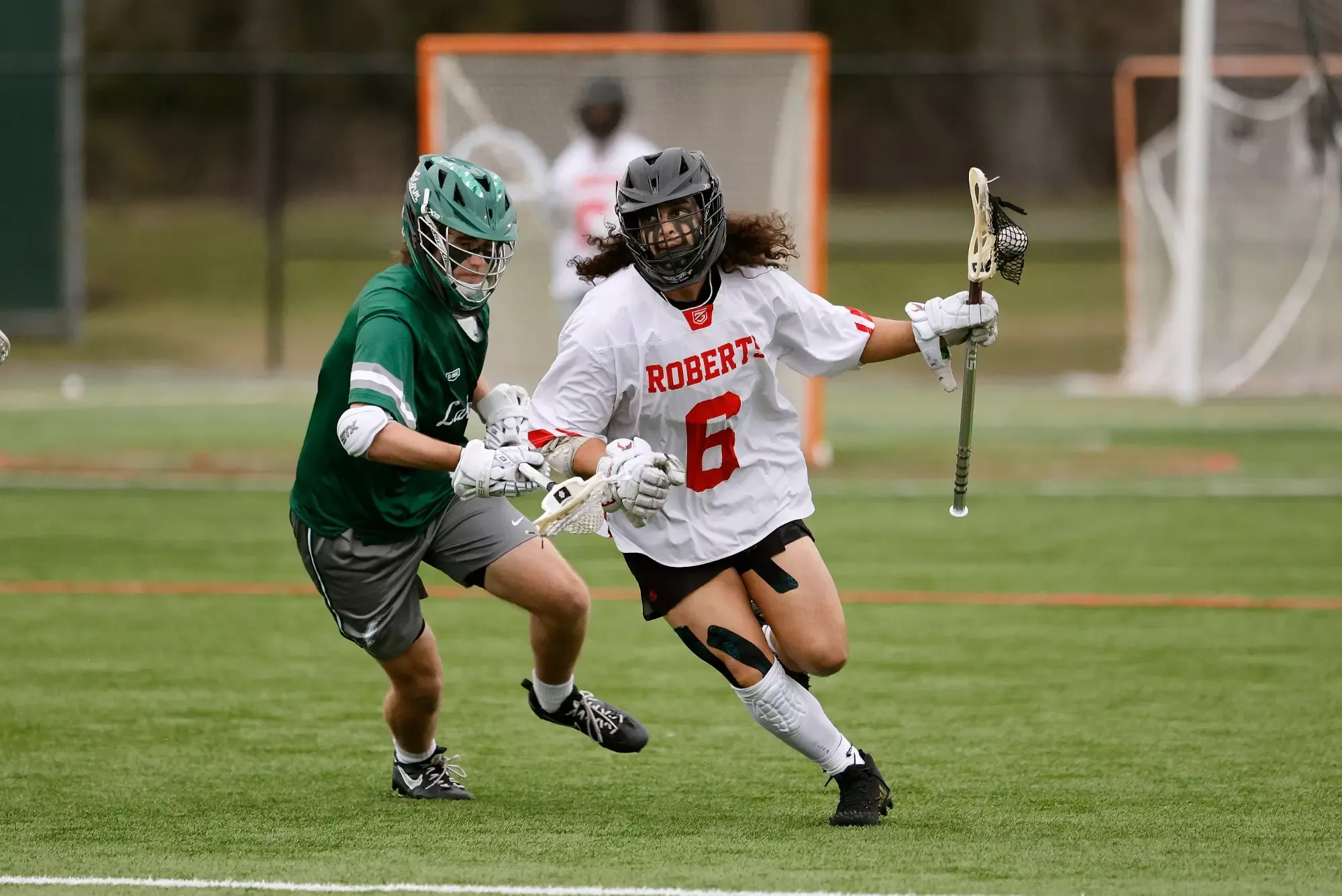Isaac Marrero attempts to dodge a defender against Lake Erie College on March 25, 2026.