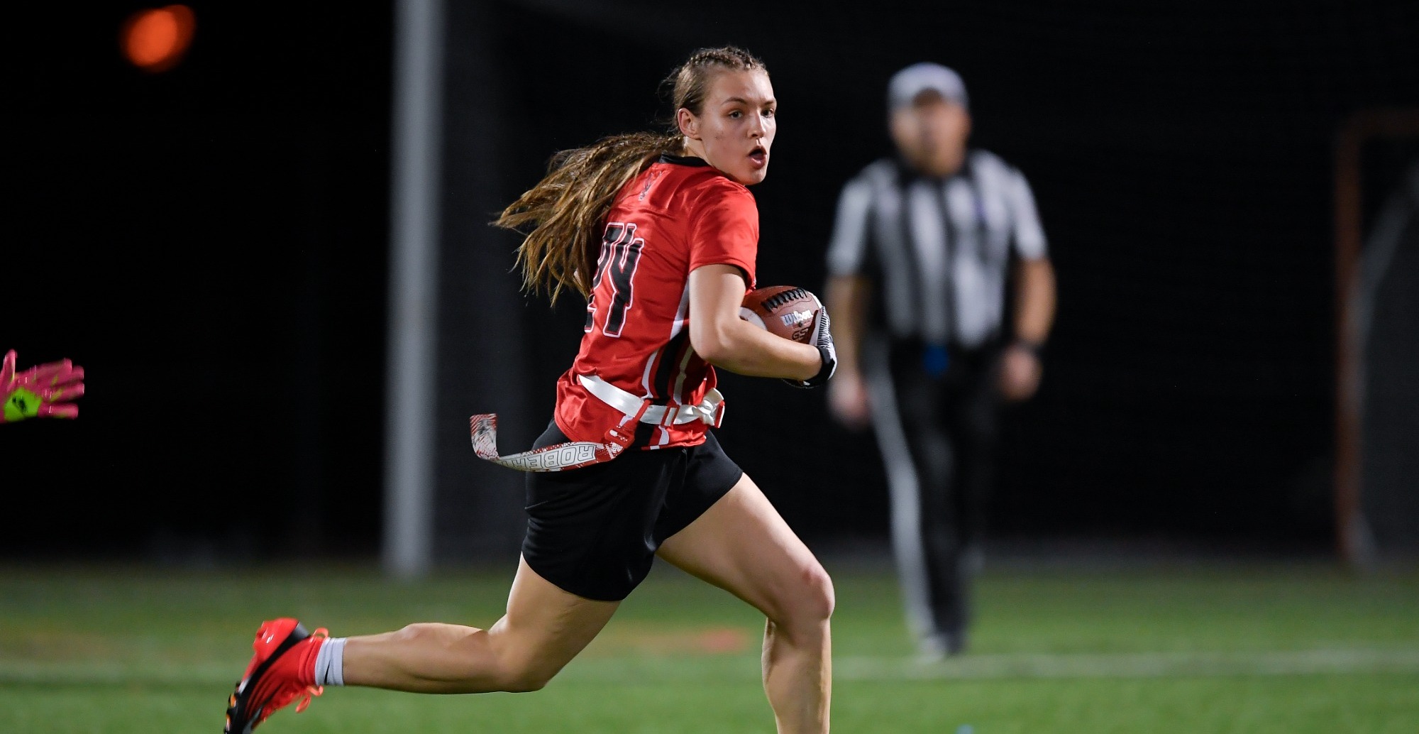Roberts Wesleyan's Sarah Seyfang plays during an NCAA college flag football game against Geneseo State in Rochester, N.Y., Saturday, March 7, 2026.