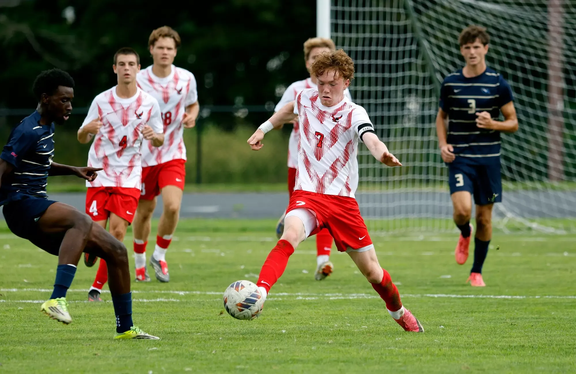 Archie Murphy dribbles upfield against Goldey-Beacom College on Sept. 12, 2026. 
