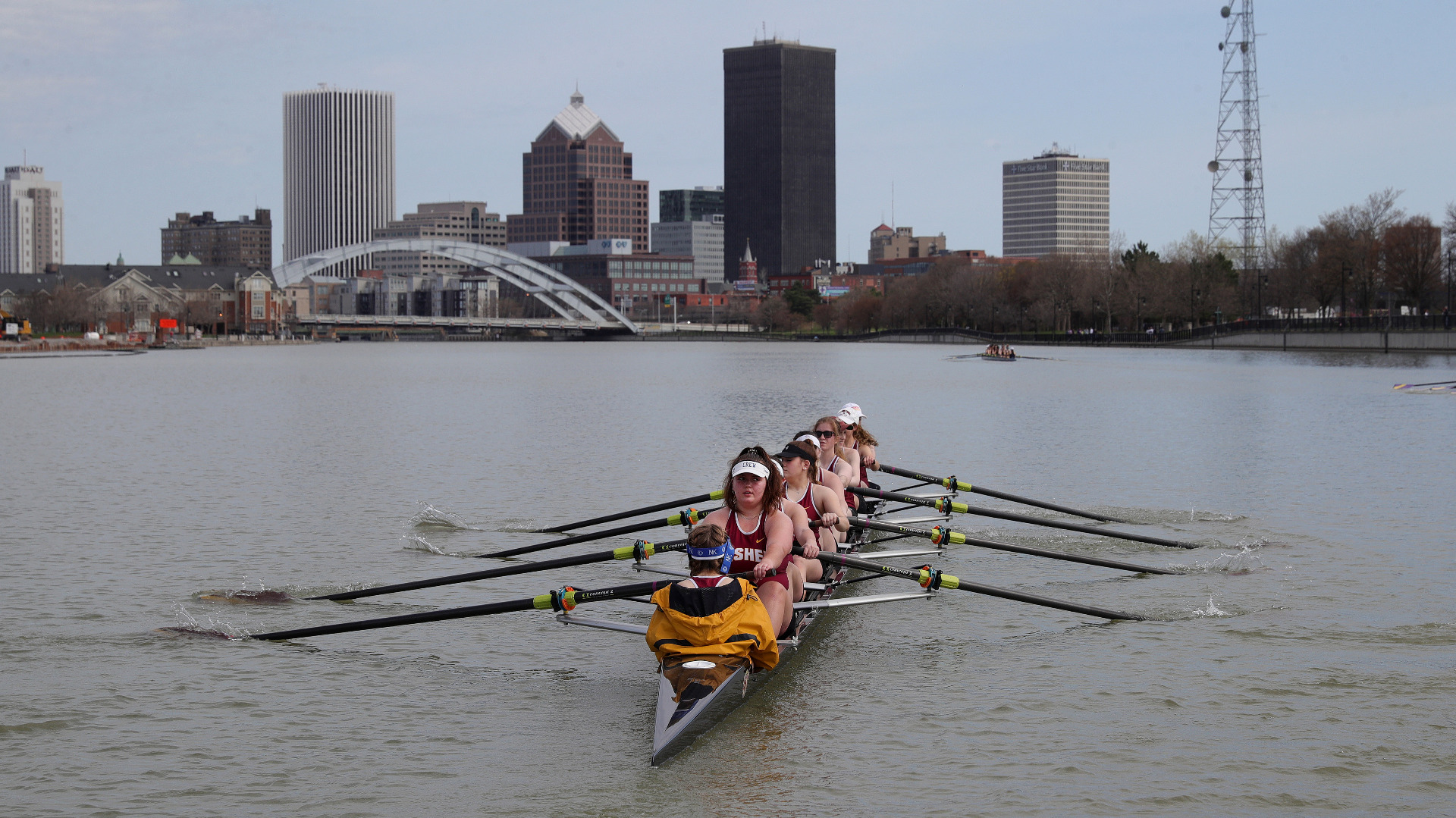 rowing over roc city skyline