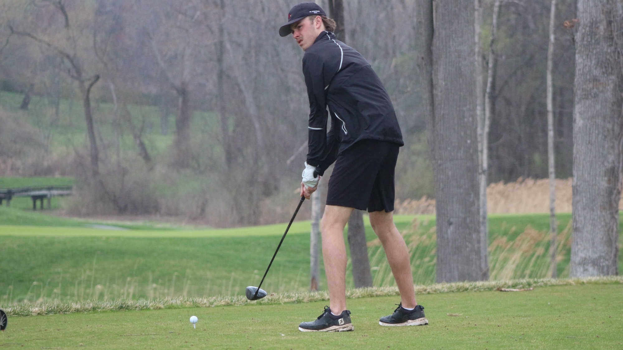 Patterson lines up to take a tee-shot during the St. John Fisher Invite