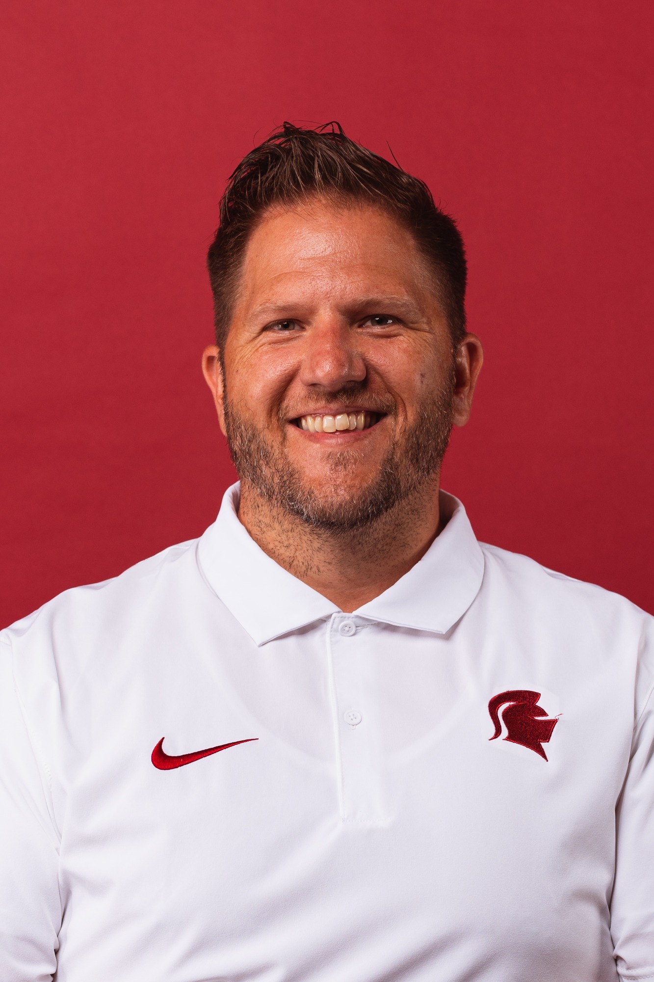 Football players get their headshots taken for the upcoming 2023-2024 season in the Photo Studio in Main Hall at Southern Virginia University in Buena Vista, Virginia on August 16, 2023 (Caleb Palmer, Marketing )