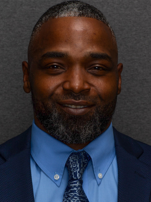 headshot of Corey Cole