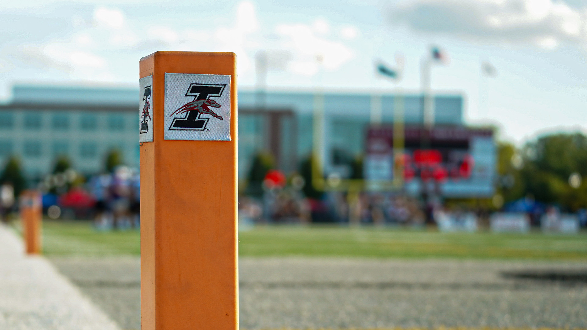 A picture of an end zone pylon, complete with a UIndy Athletics logo, at Key Stadium.