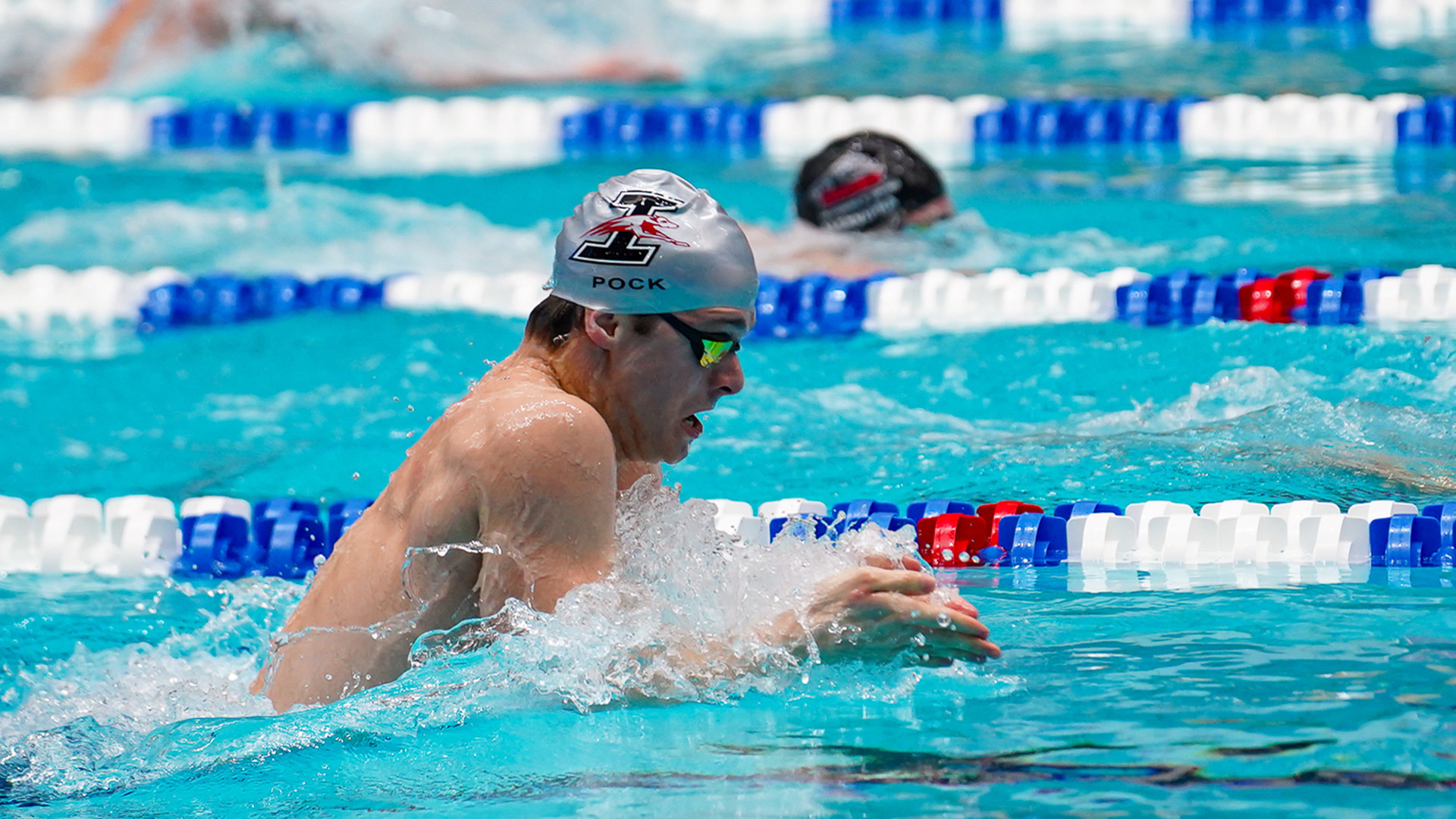 UIndy swimmer Jeremias Pock doing the breaststroke.