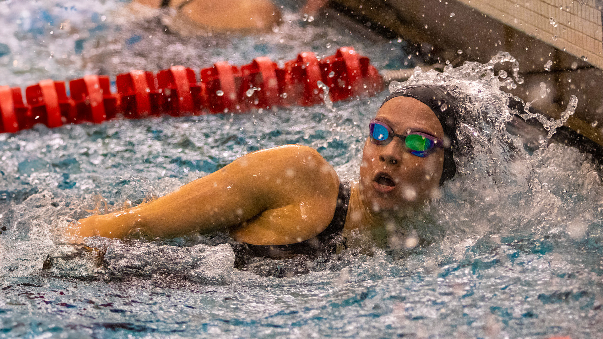 UIndy swimmer Celina Schmidt finishes a race.