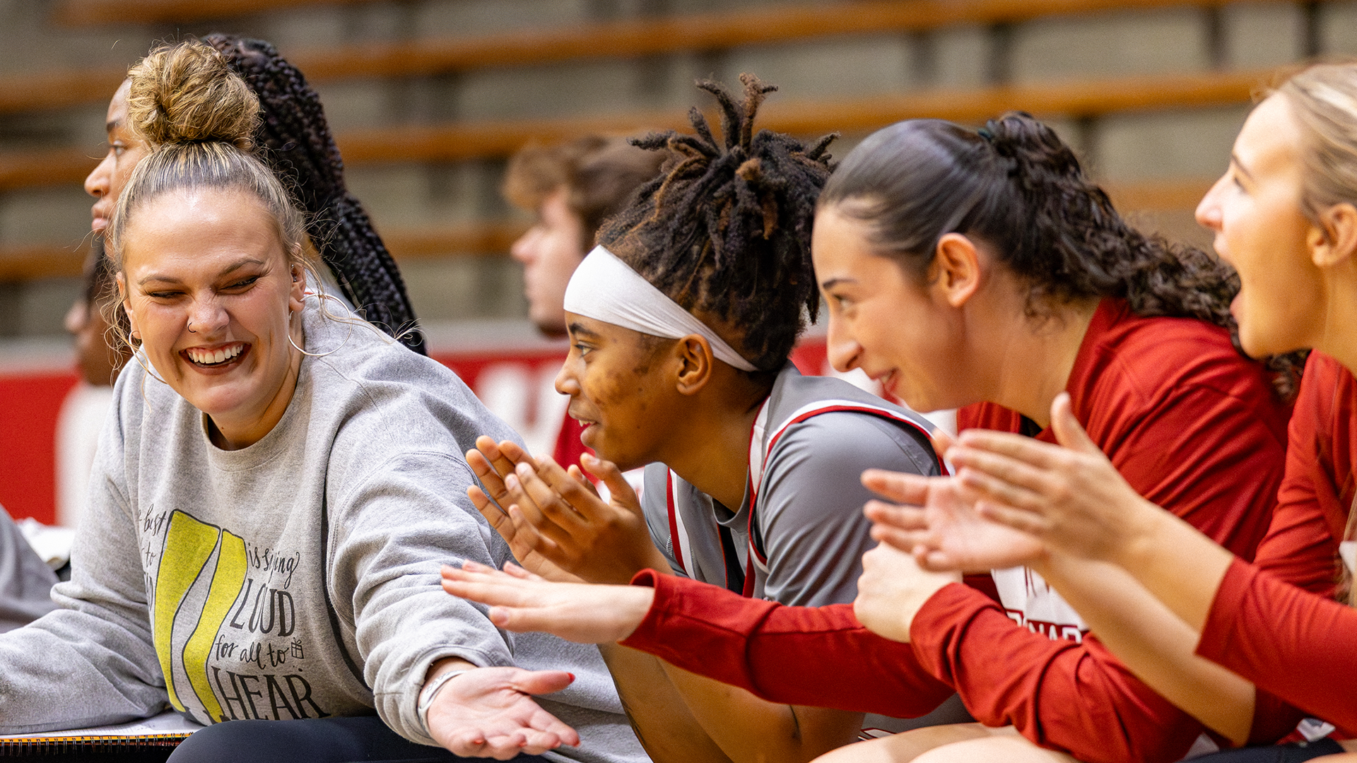 WBB Celebrating on the bench