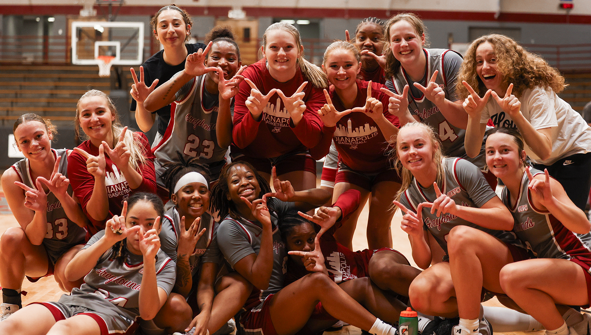 UIndy women's basketball team celebrating a win