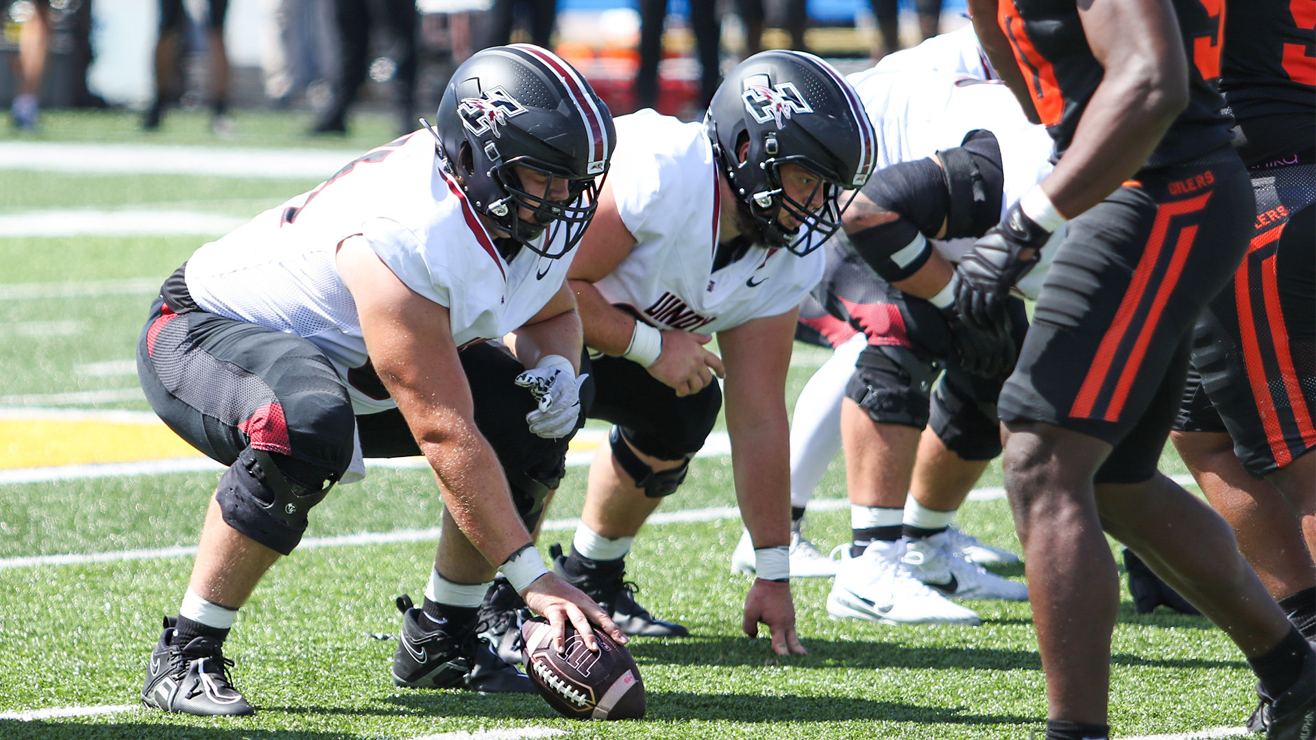 UIndy offenive linemen Ryne Buttz and Grant Ray presnap.