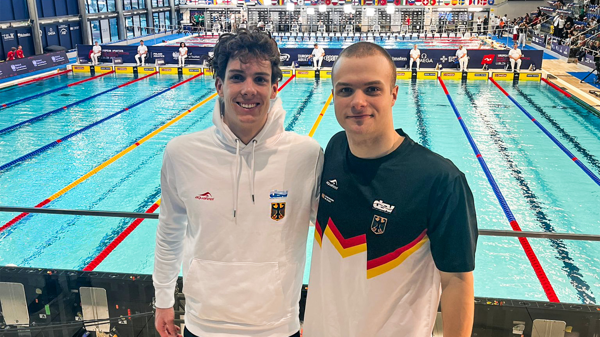 Cedric Buessing and Jeremias Pock posing together at the 2025 European Championships.