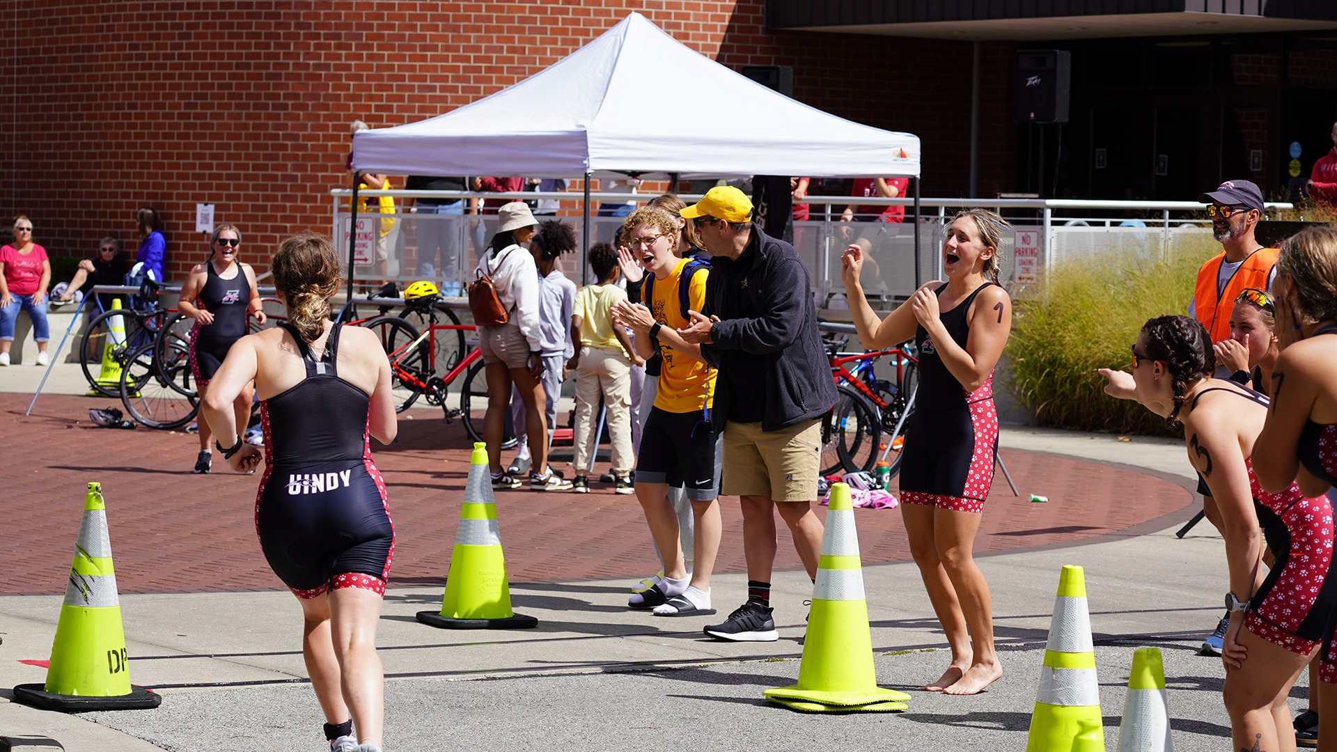 A UIndy triathlon meet takes places outside Ruth Lilly Fitness Center.