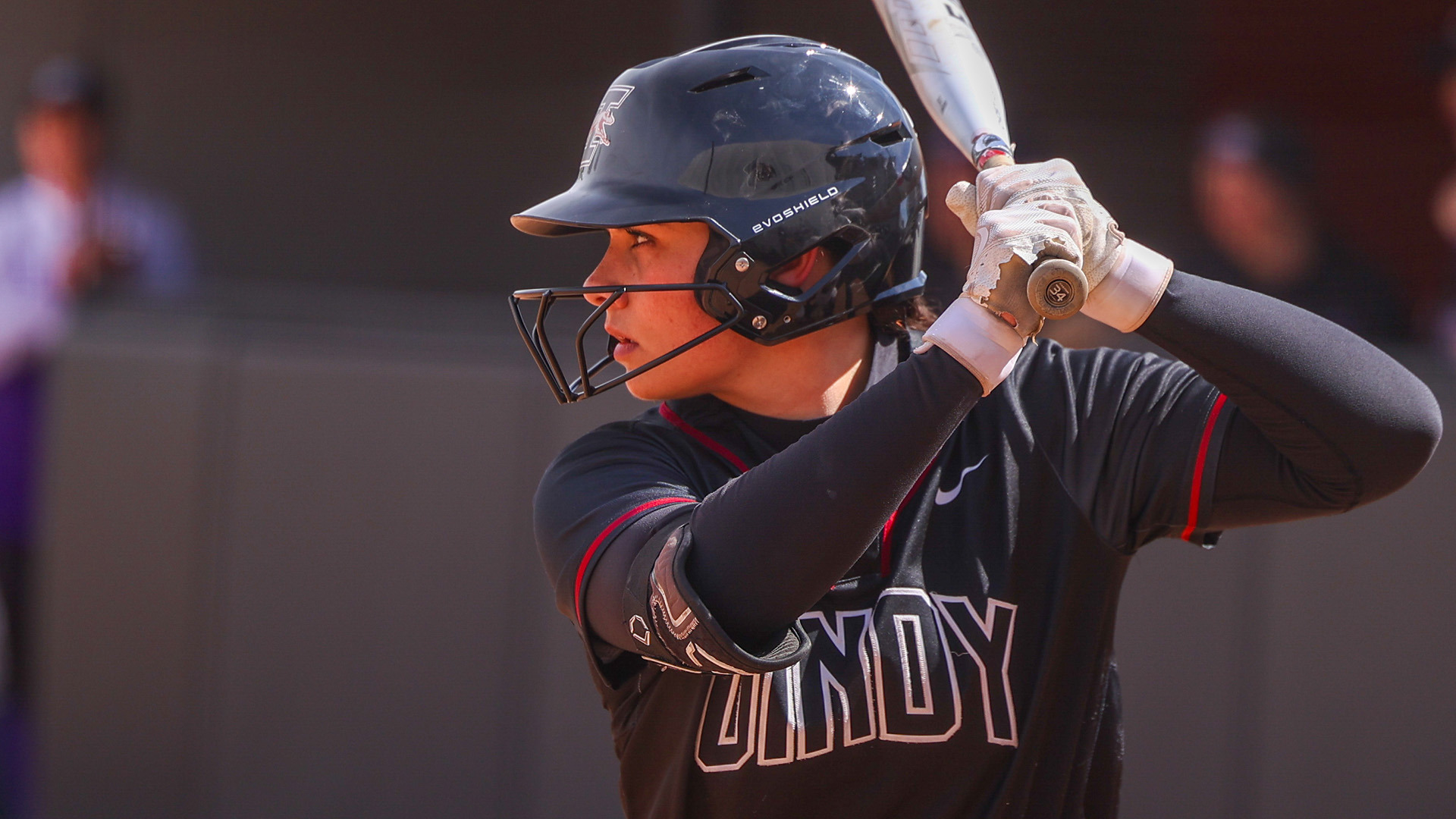 UIndy softball freshman Josie Jager stands at the plate.