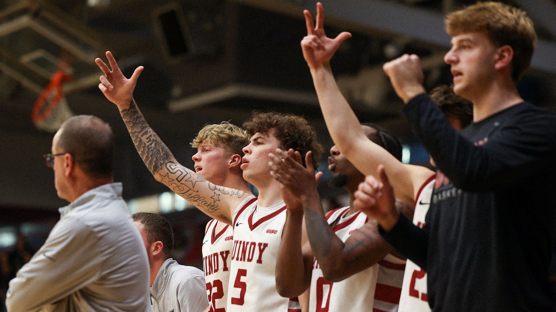 UIndy bench celebrates a made three