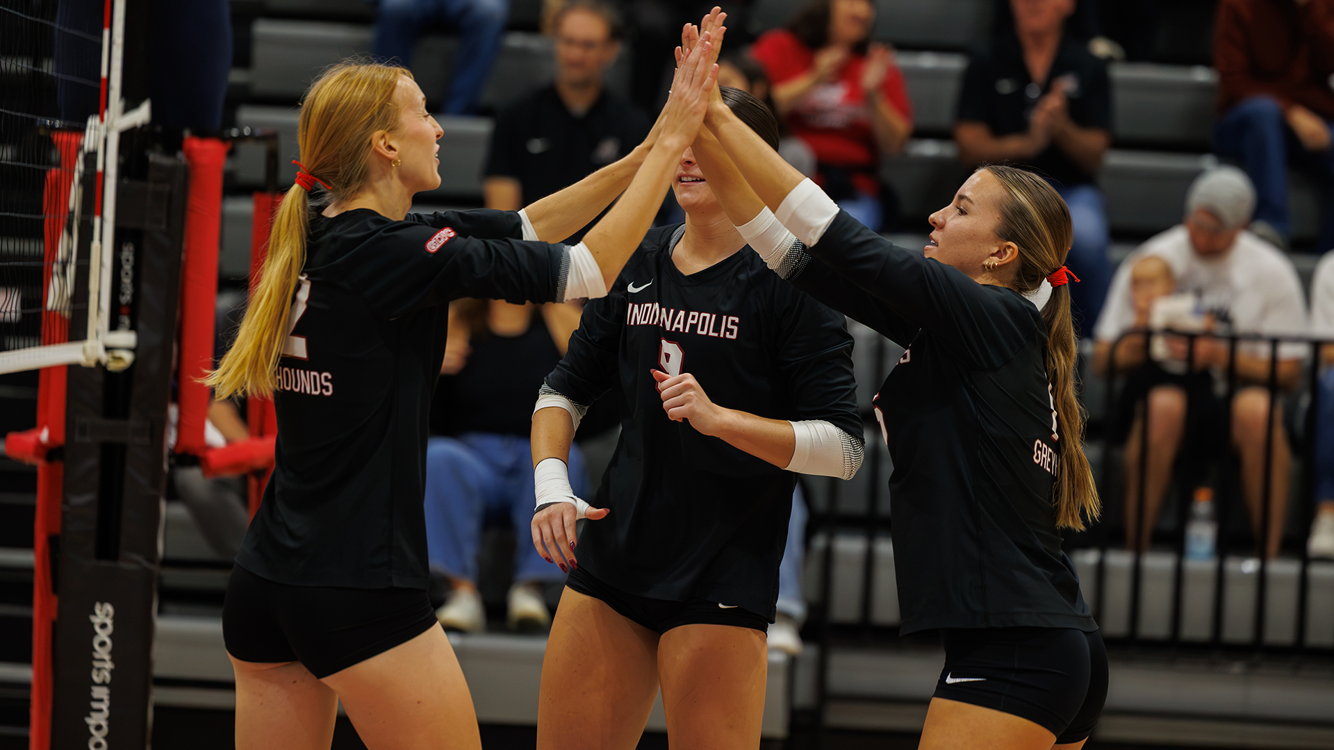 Allison Jansen and Makenzie Pflederer high five