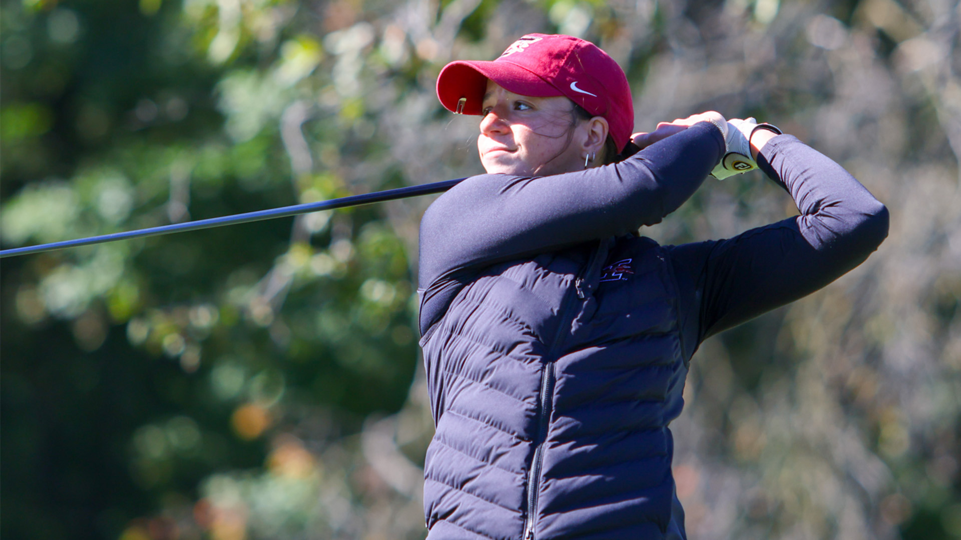 UIndy golfer Caroline Whallon teeing off.