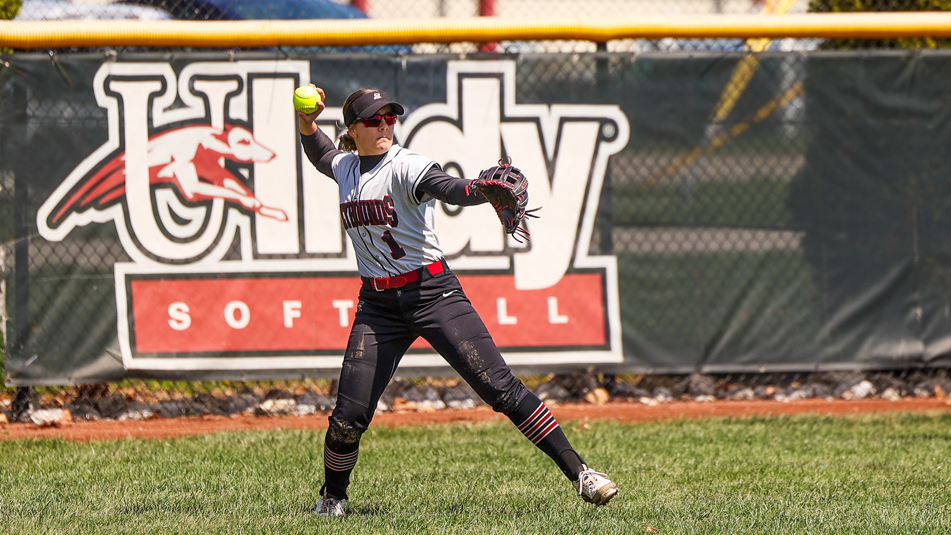Brooklyn Willis throwing the ball in from the outfield.
