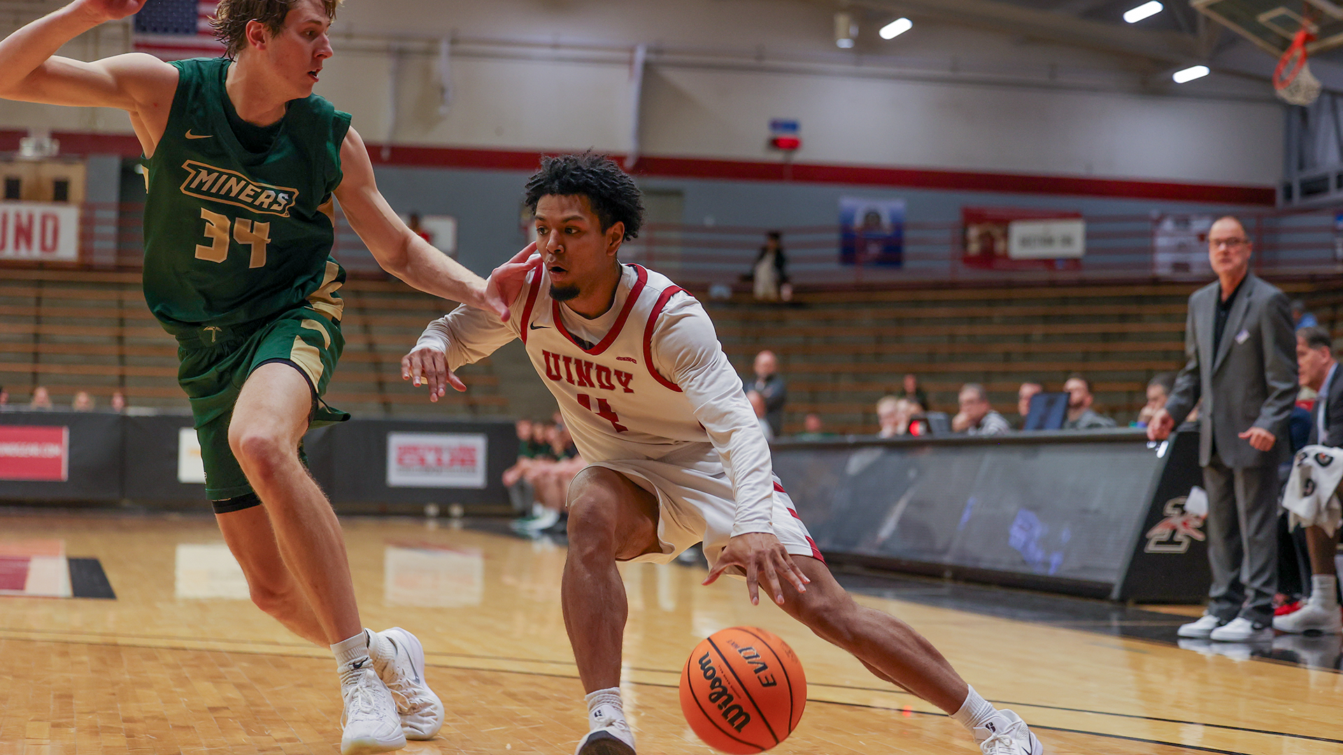 Noah Kon drives past S&T defender