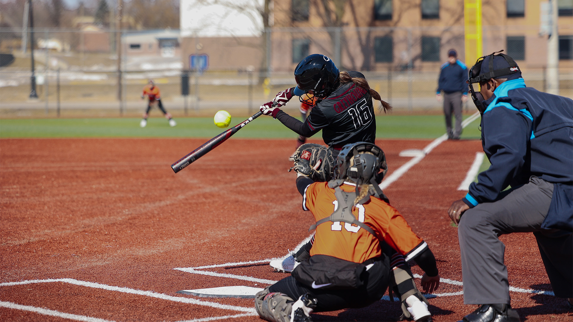 Sydney Oliver swinging the bat.