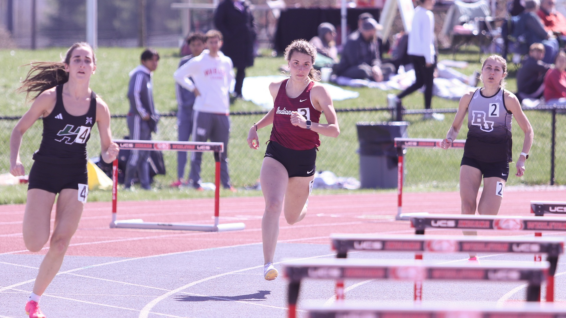 Cloey Simon running the hurdles at Indiana Wesleyan