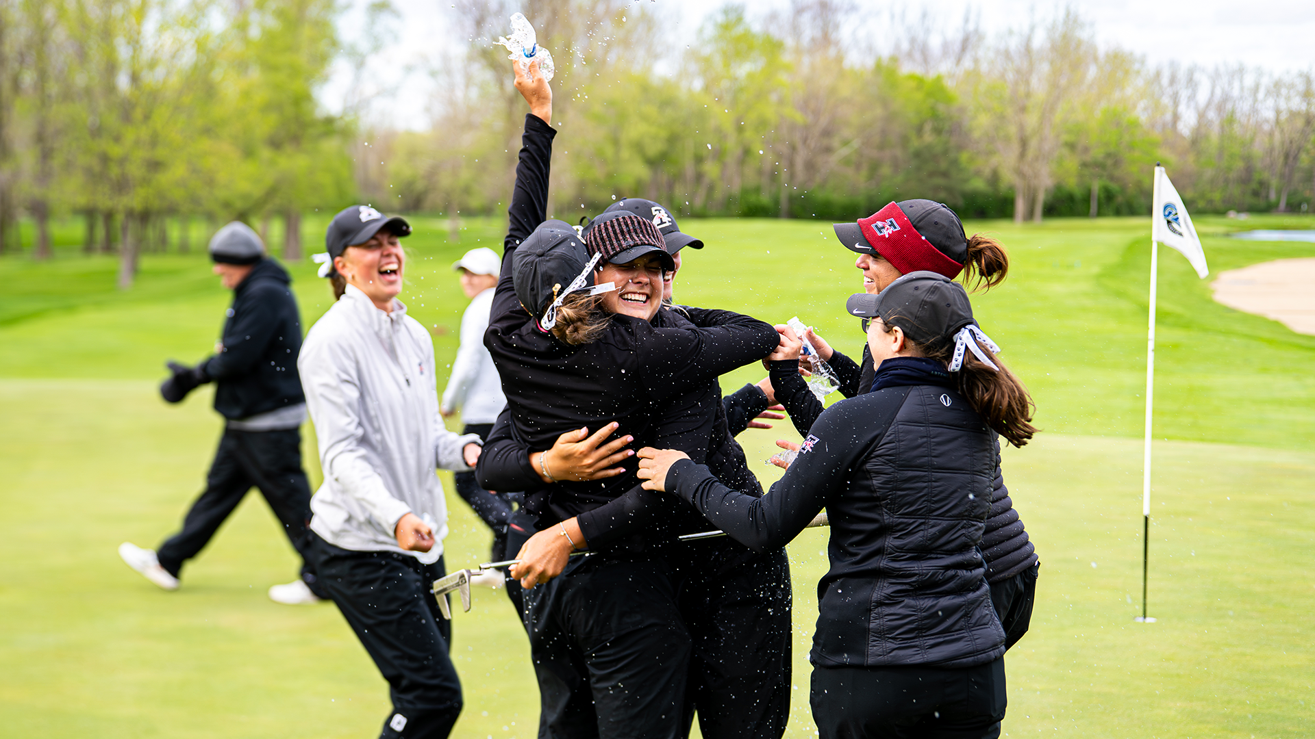 UIndy women's golf celebrating GLVC Championships