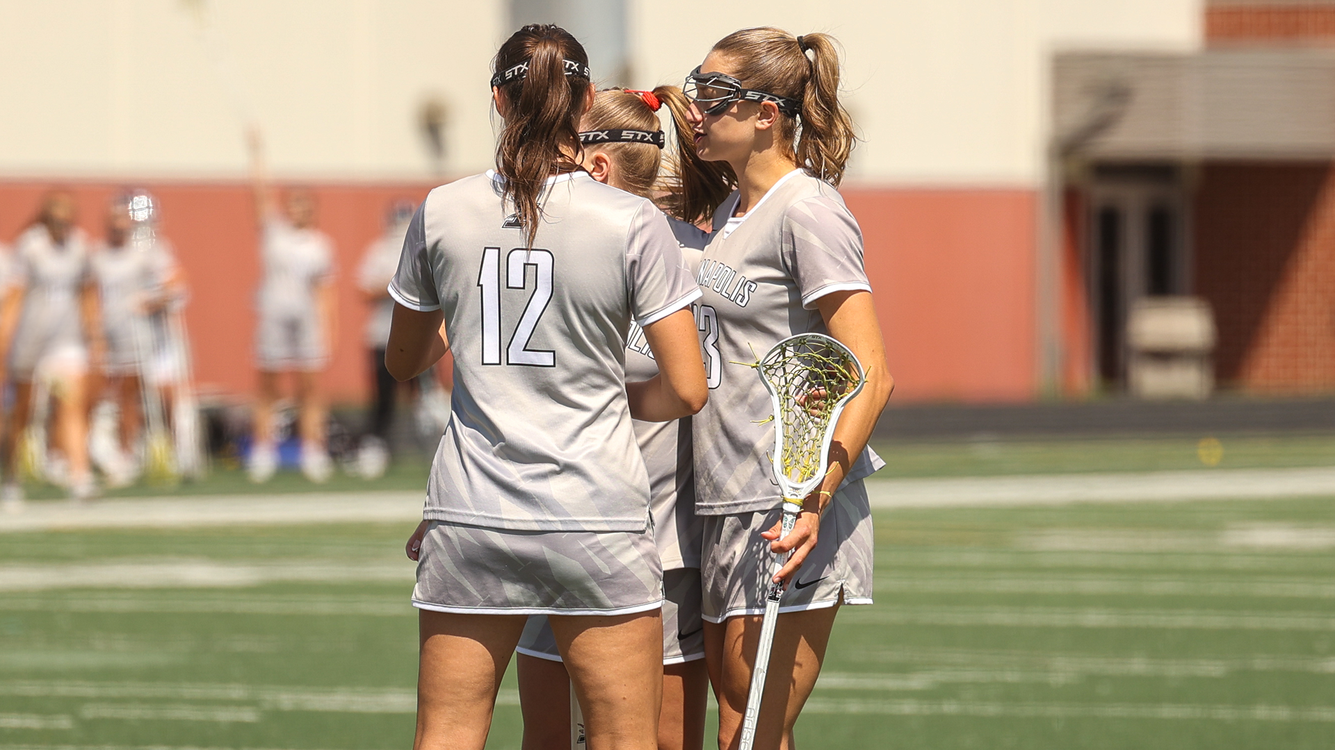Sage Da Silva, Olivia Bladon and Malaena Michielin celebrating a goal