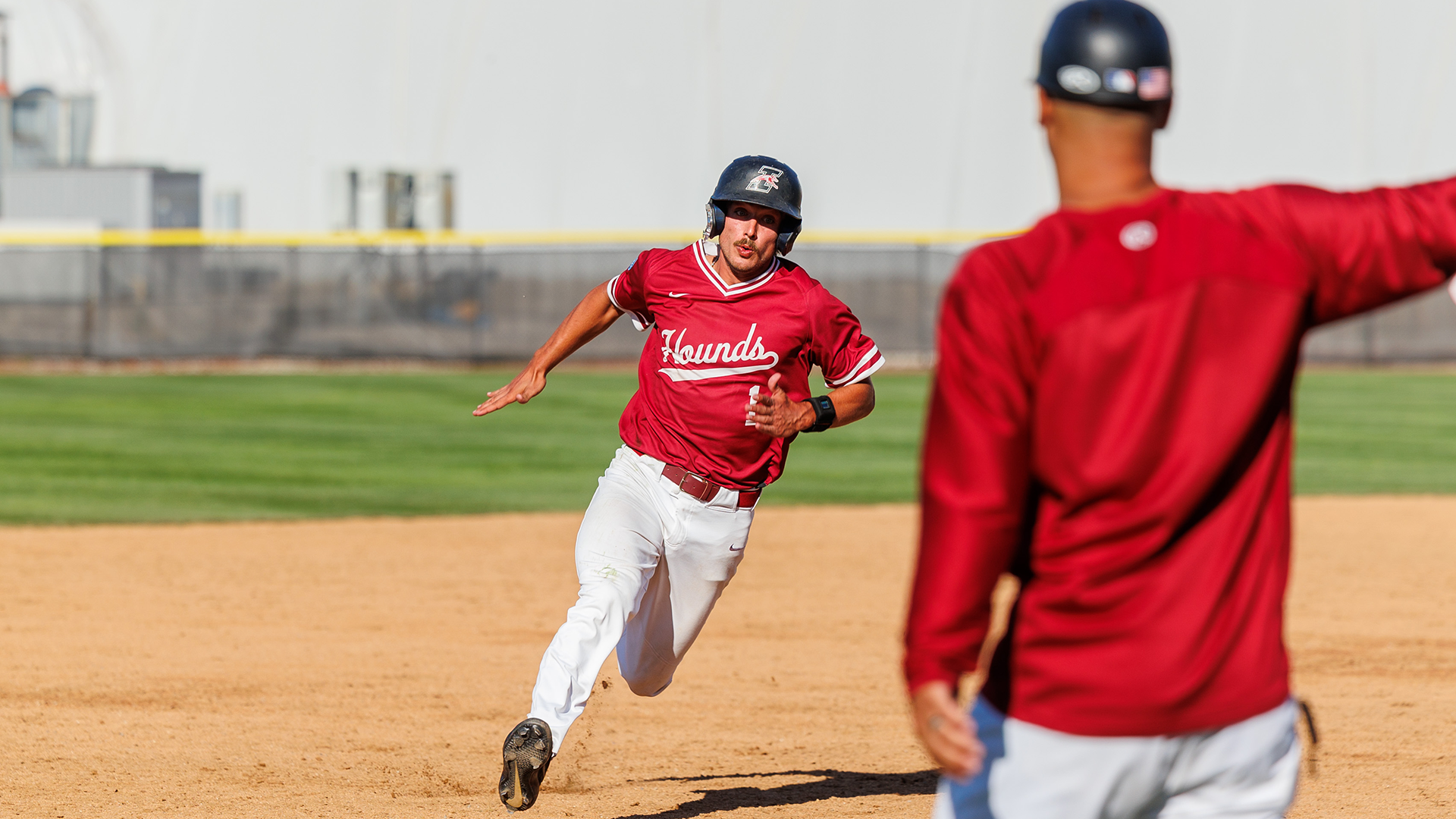 Joey Humphrey looks to take third base