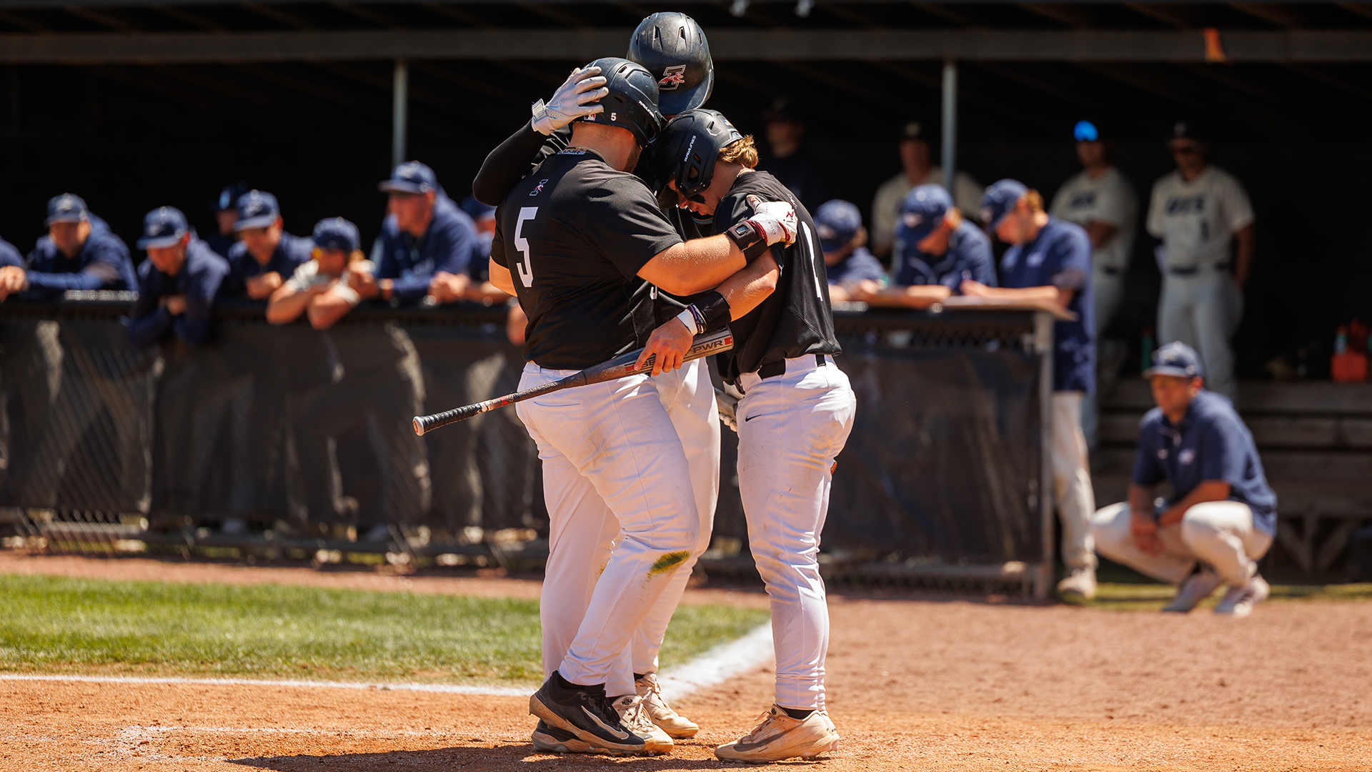 UIndy celebrating a Brayton Bowen home run