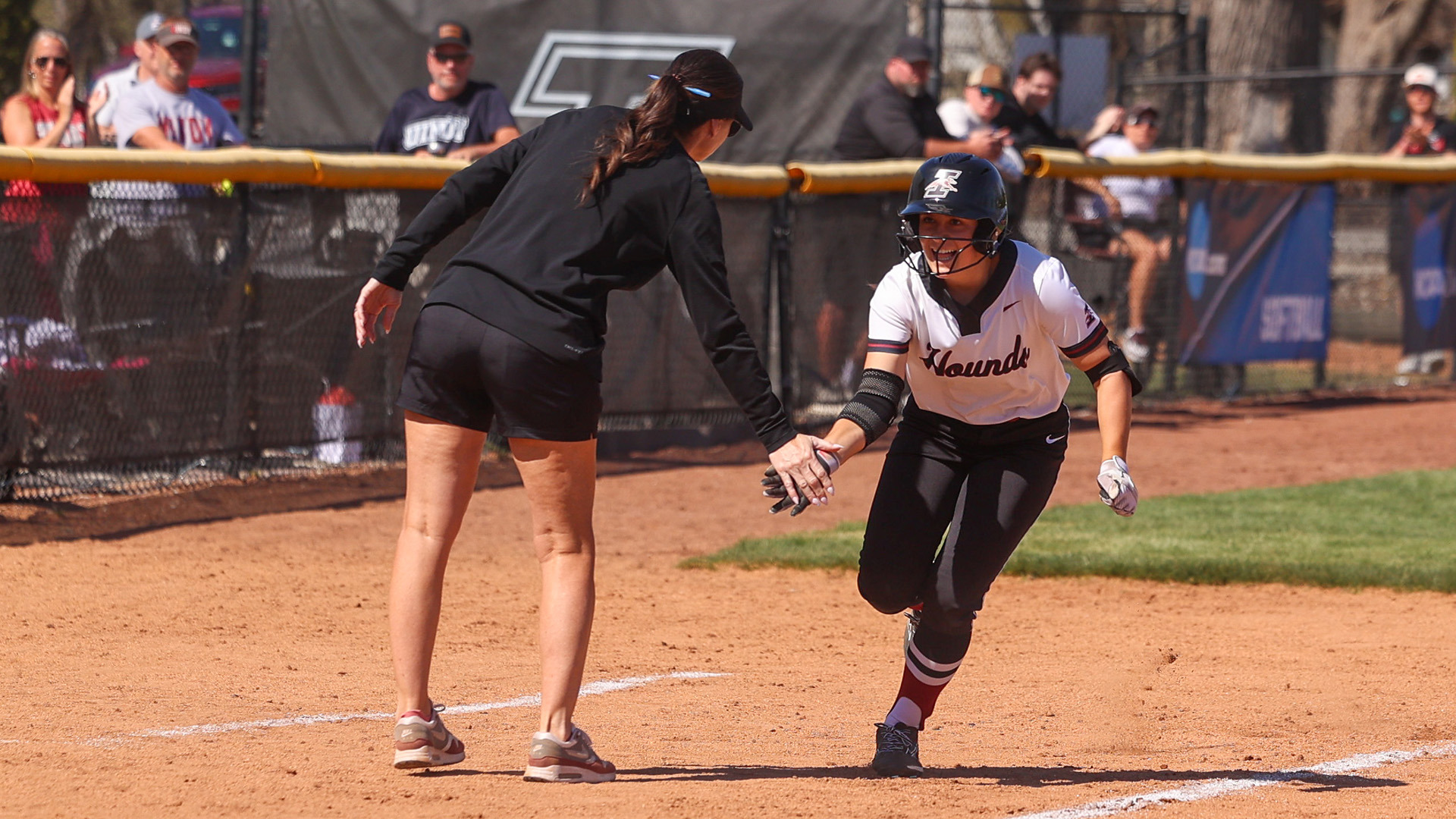 Brooklyn Willis rounds third base after hitting a home run.