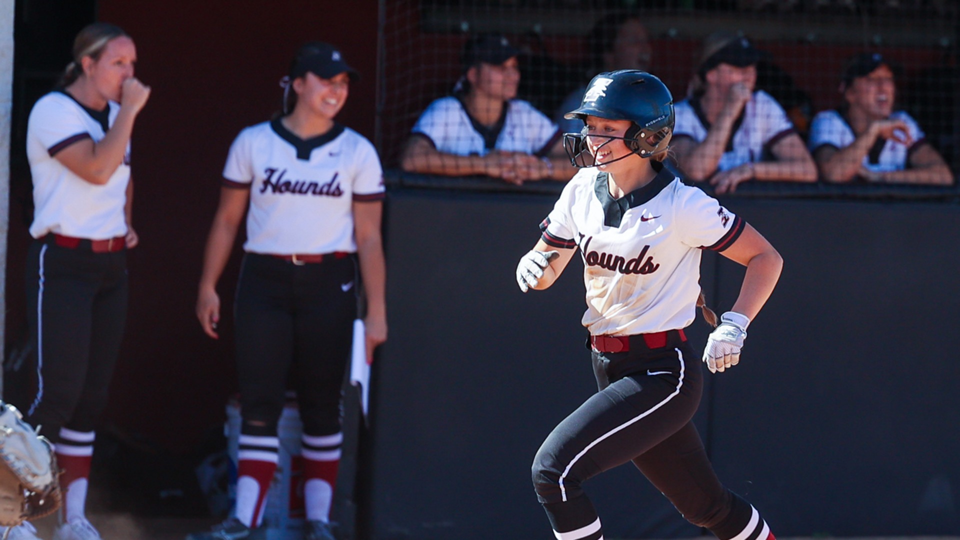 Sydney Oliver jogs into home.