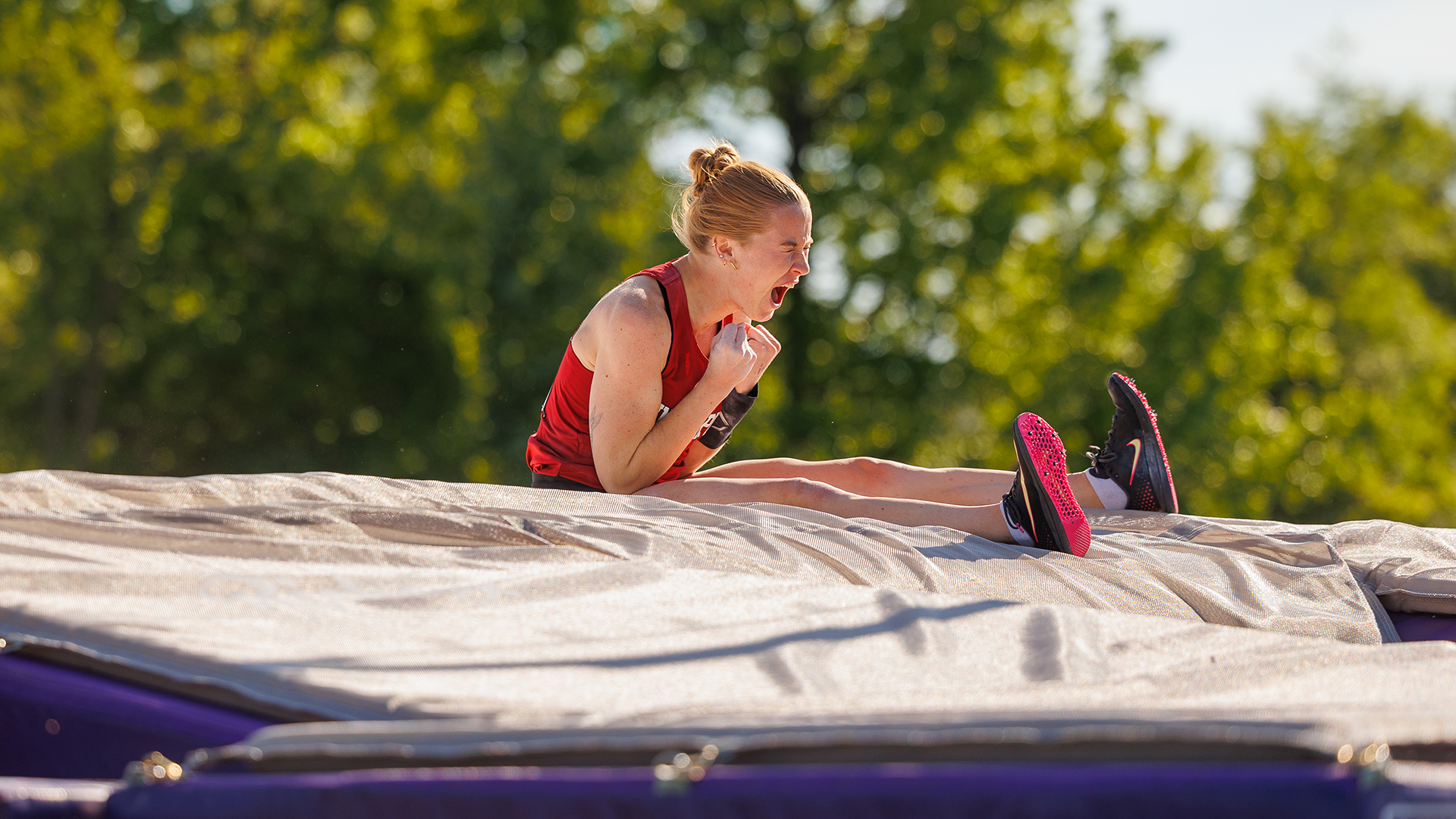 Mackenzie Van Bibber celebrates clearing the bar at the 2026 OTF GLVC Championships