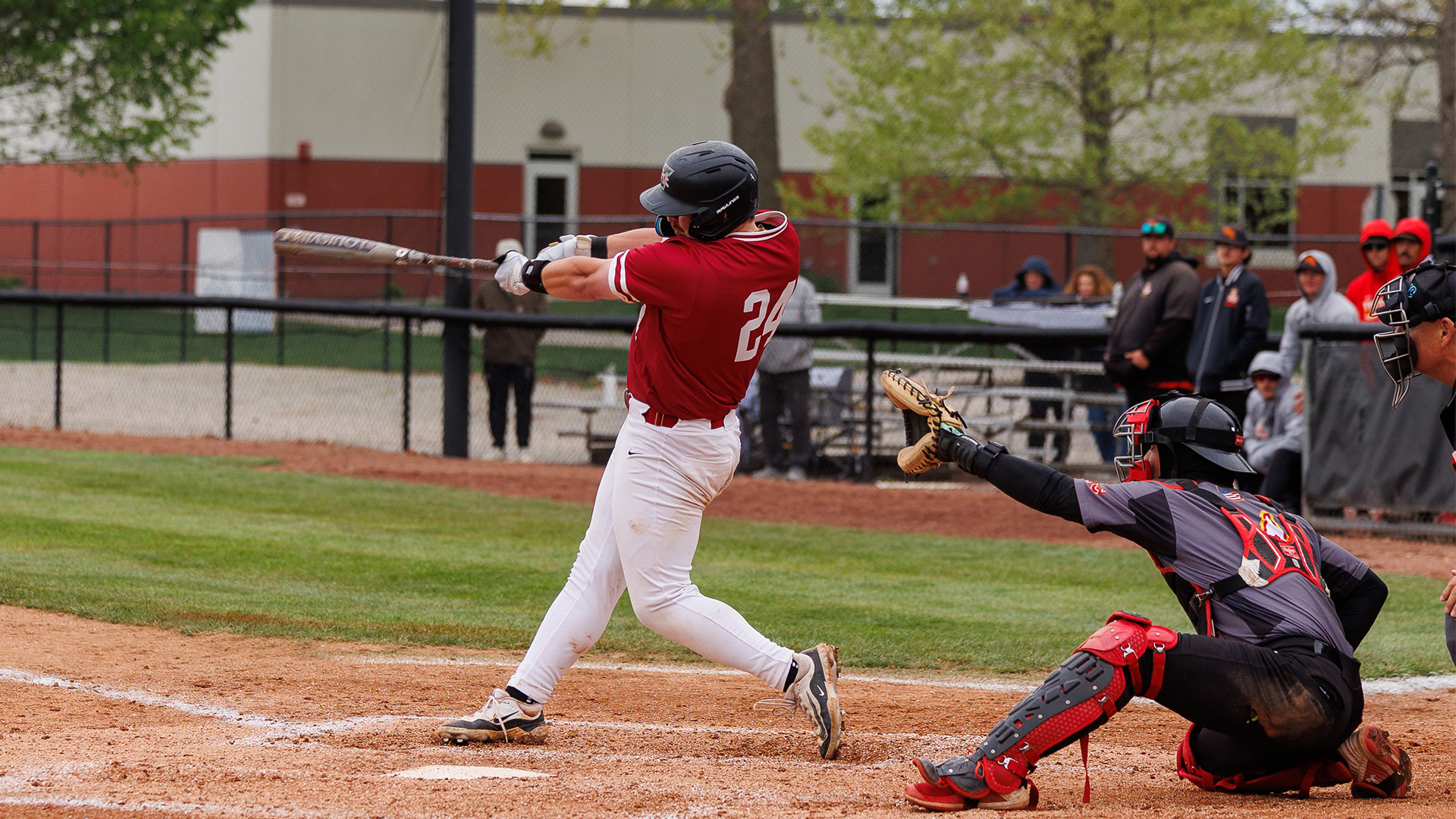 Austin Bode swining the bat.