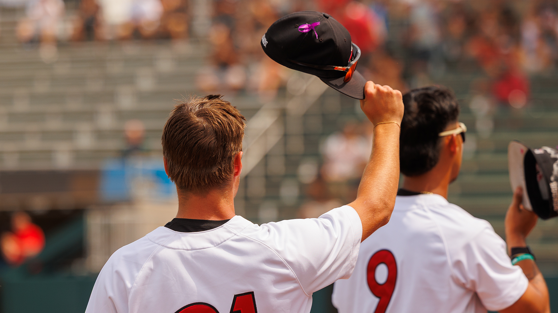 UIndy Baseball Player tipping his cap