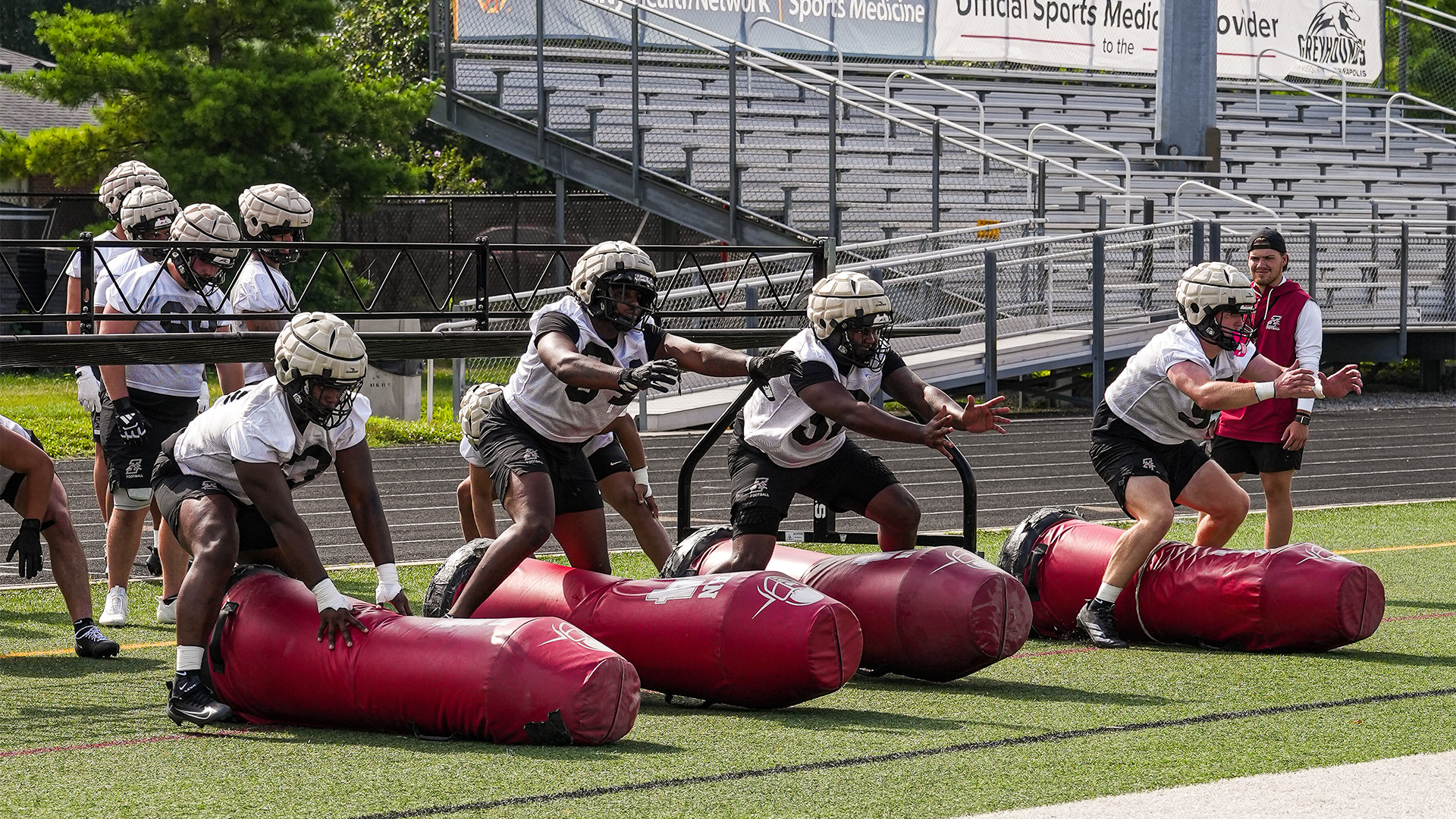 The UIndy defensive lineman doing drills in practice.